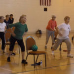 Senior women working out in gym